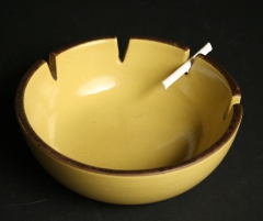 Heath Ceramics, mustard colored ashtray with candy cigarette