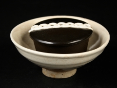 Chinese Song dynasty 960-1279 Cizhou ware bowl excavated from the buried city of Julu in the early 20th century with Hostess cupcake