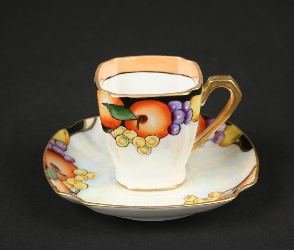 Noritake Co., Japan (1904 - present), Noritake demitasse cup and saucer with fruit motif, (1926 - 1931), porcelain with mother of pearl lustre, Gift of Judith and Martin Schwartz, 2018.56 