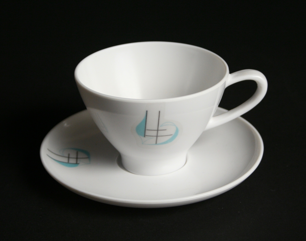 Prolon, Florence, Mass., manufacturer (established 1854), Irving Harper, designer (1916-2015), Regatta Melmac turquoise with a black on a white background, cup and saucer, 1958, plastic, Museum Purchase, 2016.177