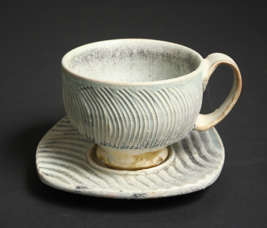 Robert Sutherland (American, b. 20th century), salt-fired stoneware cup and saucer with striations, 1990s, stoneware, salt-fired, Gift of Margaret Carney and Bill Walker, 2019.173