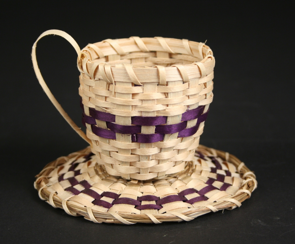 Robin Lazore, Mohawk basket maker (Native American, Akwesasne, a Mohawk community), Mohawk cup and saucer basketry, 2016, black ash and sweetgrass, woven with Welch's grape juice dye, Museum Purchase, 2016.55.