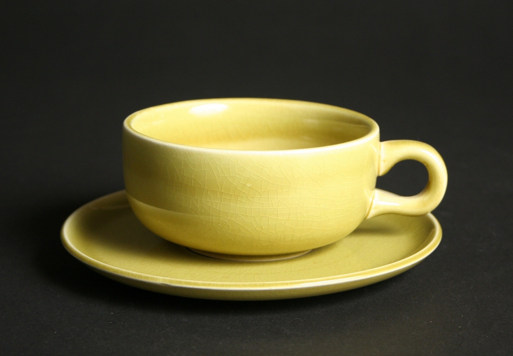 Steubenville Pottery Company, Steubenville, Ohio, manufacturer (1879-1959), Russel Wright, designer (American, 1904-1976), American Modern chartreuse cup and saucer set, ca. 1939, earthenware, glazed, Gift of Doris and Jim McEwen, 2013.40