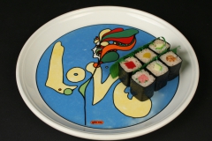 Syracuse China Peter Max Love plate with sushi
