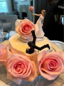 Wedding cake with dishes set on the table